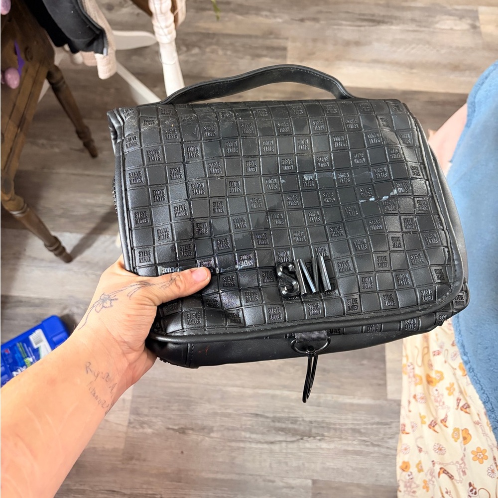 Block embossed logo hanging cosmetic bag Steve madden